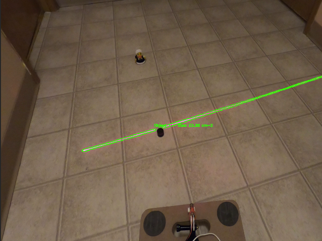 Laser line detection identifying an object on a tiled floor